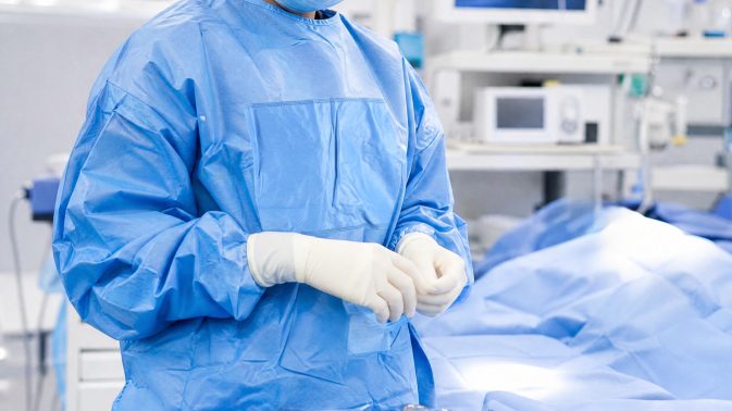 Surgeon in a sterile gown